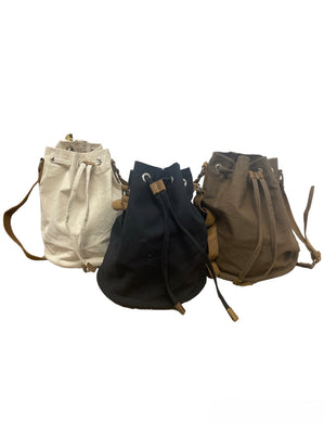 Leather and Canvas Bucket bags. Brown, Black, and White.