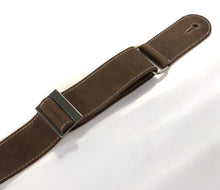 Leather Guitar strap (Rustic) lied flat without leather string attachment, showing the metal strap adjuster