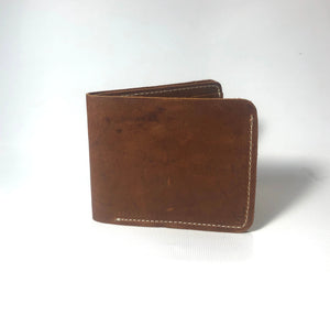 Buffalo bi-fold wallet faces the side so we can see the beautiful rustic front.
